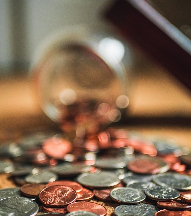 jar of coins spilling out